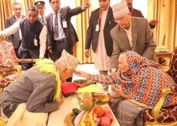 President Paudel receives tika from his elder sister-in-law