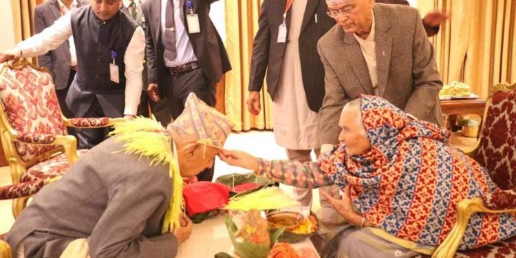 President Paudel receives tika from his elder sister-in-law