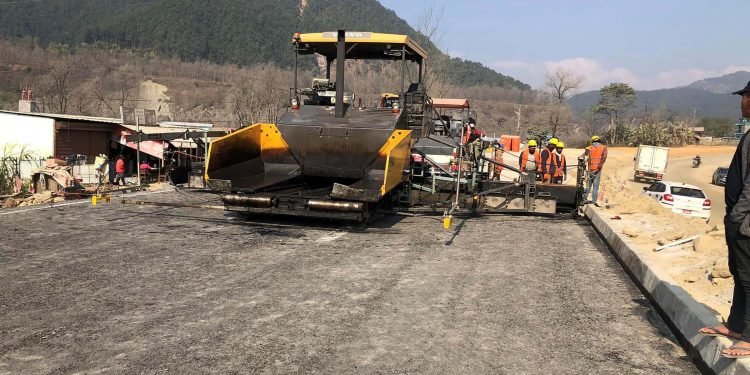 Muglin-Pokhara road: Blacktopping using asphalt technology starts in west section