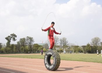 Nepali army man sets record for most skips on upright tyre