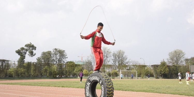 Nepali army man sets record for most skips on upright tyre