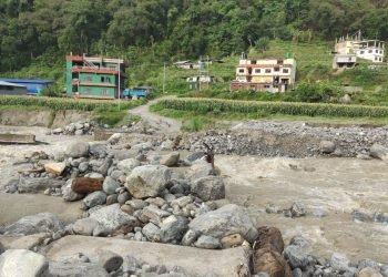 Flood-fed Melamchi sweeps away a temporary bridge