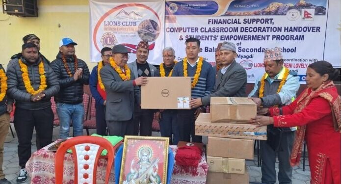 Two schools get computers, educational materials