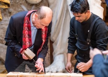 Prince Edward tries his hand at wood carving in Bhaktapur