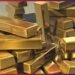 Gold price drops marginally