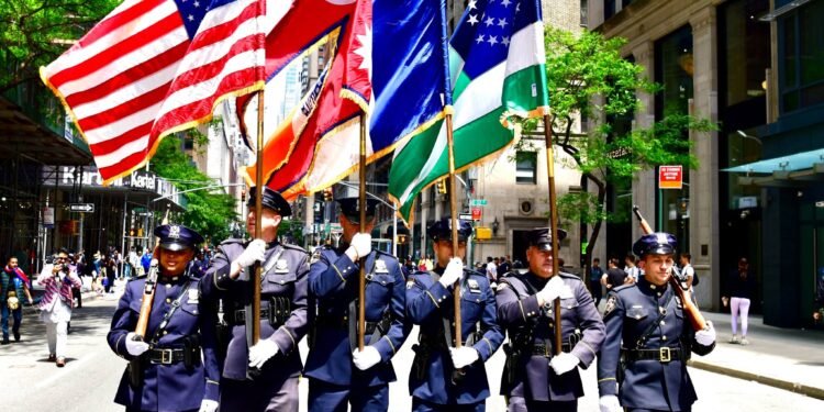 For the first time in American history, the New York Police Department raises the Nepalese flag.