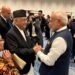 PM Oli meets Indian PM Modi informally
