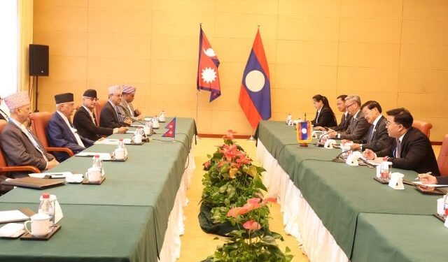 PM Oli meets with Lao PDR President in Tianjin