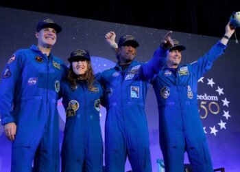 Artemis II’s moon-traveling astronauts return home to cheers after a record-breaking trip