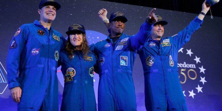 Artemis II’s moon-traveling astronauts return home to cheers after a record-breaking trip