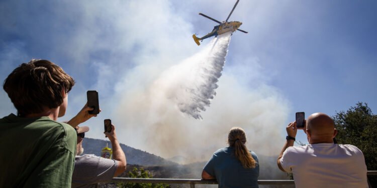 Brush fire near Los Angeles forces thousands to evacuate