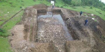 Pond constructed in community forest for wildlife