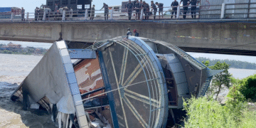Washed away mini-cruise ship remains stuck at Narayani Bridge